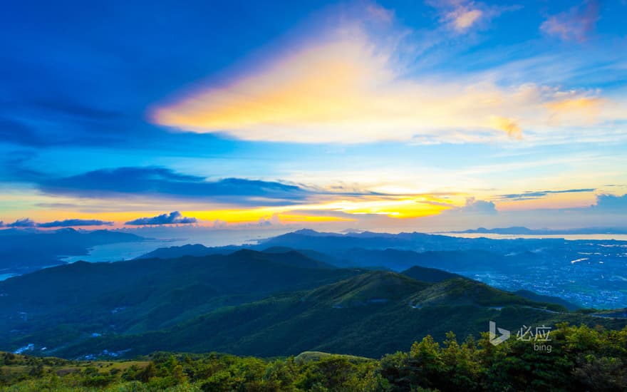 Majestic mountains and rivers in the setting sun