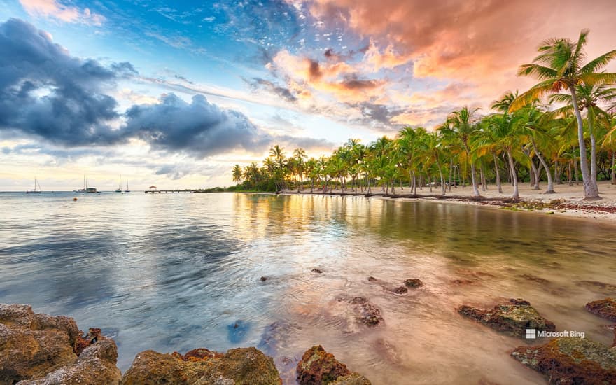 Sunset over Anse Champagne beach in Saint-François, Guadeloupe, Caribbean